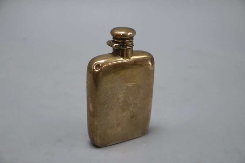 A sterling hip flask, with engraved monogram, 12.2cm, 3.5oz.